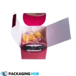 Colorful custom candy boxes designed for birthday parties, featuring fun designs and personalized messages for guests.