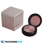 Close-up of custom foundation box with logo branding for cosmetics packaging.